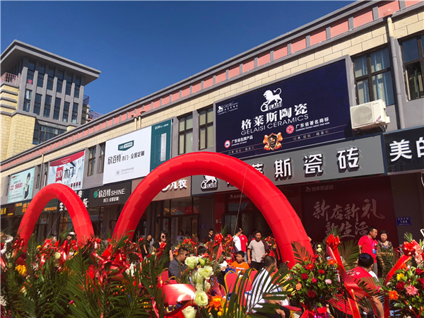 醒狮助兴迎新店，红红火火开门红